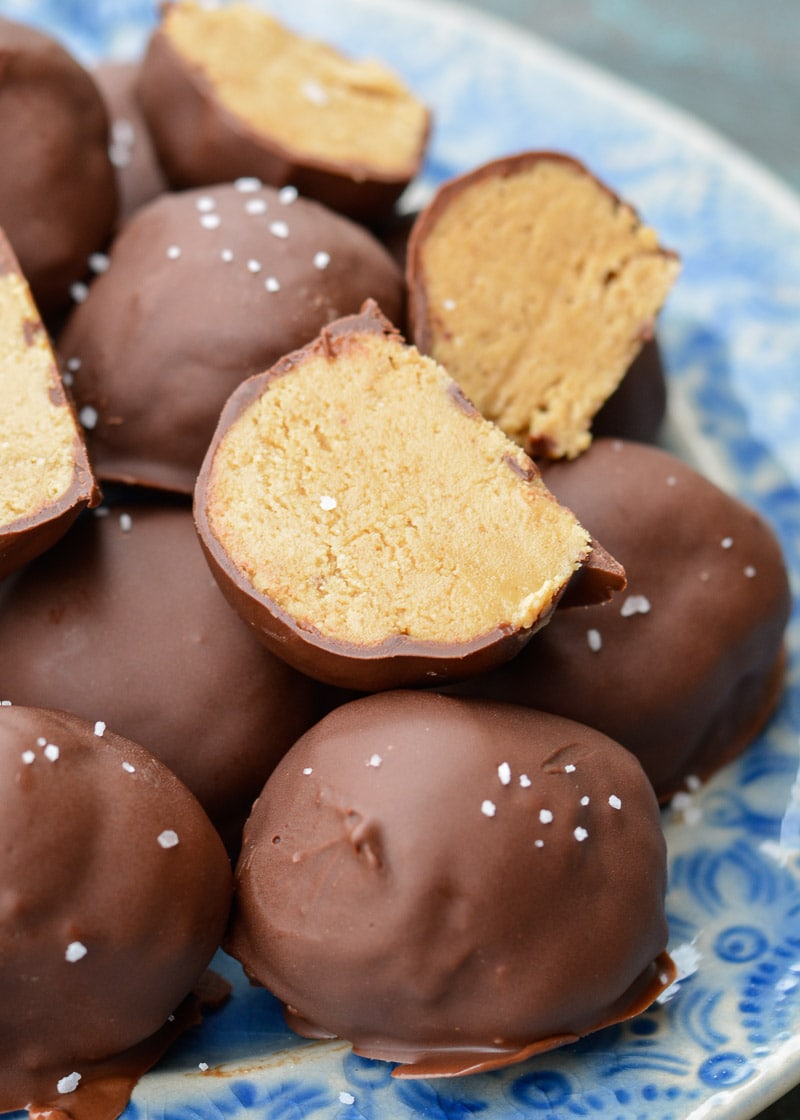 These sweet Peanut Butter Balls are the perfect no bake, low carb treat! Each peanut butter bite has about 3 net carbs making it the perfect low carb snack recipe! 