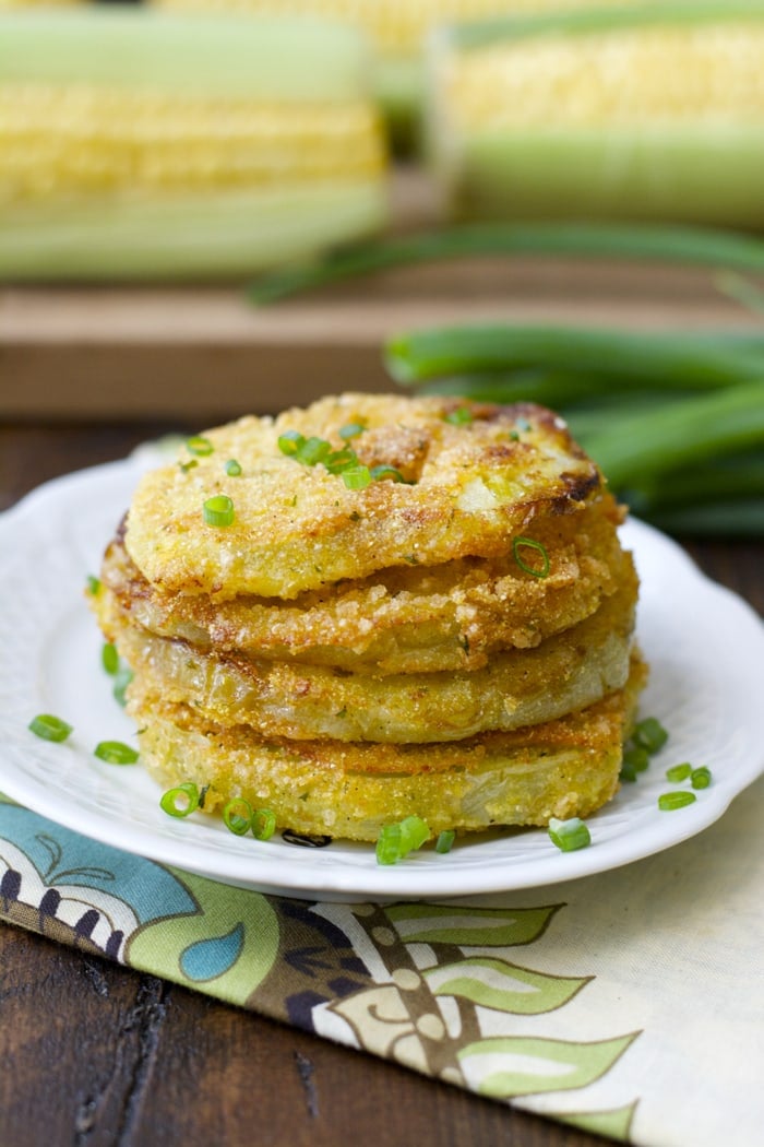 fried green tomatoes in a stack on a plate