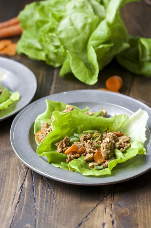 two tuna lettuce wraps on a gray plate