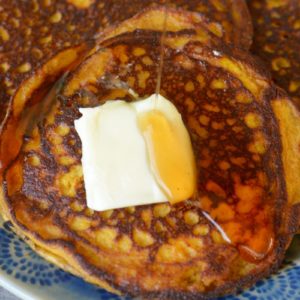 Ultra fluffy Keto Pumpkin Spice Pancakes are perfect for a decadent Fall breakfast! Each pancake contains only 2.5 net carbs!  