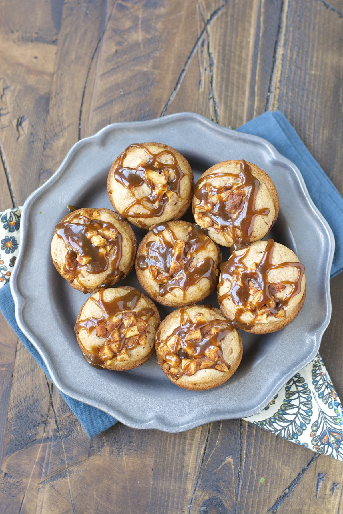 Caramel Smothered Apple Cinnamon Cupcakes! These sweet treats are gluten free and so easy to make! 