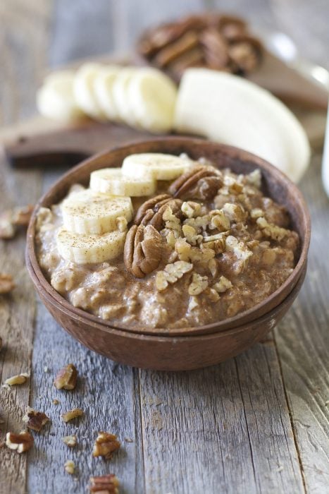 These easy Banana Overnight Oats are packed with sweet banana flavor, gluten free oats, cinnamon and maple syrup! A secret ingredient makes these a protein packed grab and go breakfast!