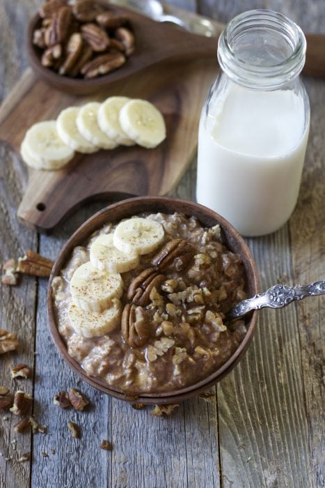 These easy Banana Overnight Oats are packed with sweet banana flavor, gluten free oats, cinnamon and maple syrup! A secret ingredient makes these a protein packed grab and go breakfast!