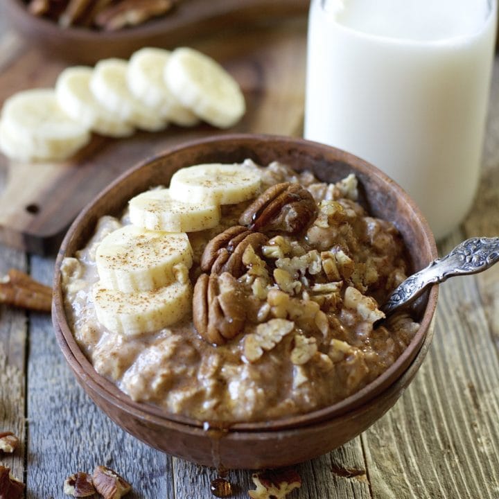 These easy Banana Nut Overnight Oats are packed with sweet banana flavor, gluten free oats, cinnamon and maple syrup! A secret ingredient makes these a protein packed grab and go breakfast!