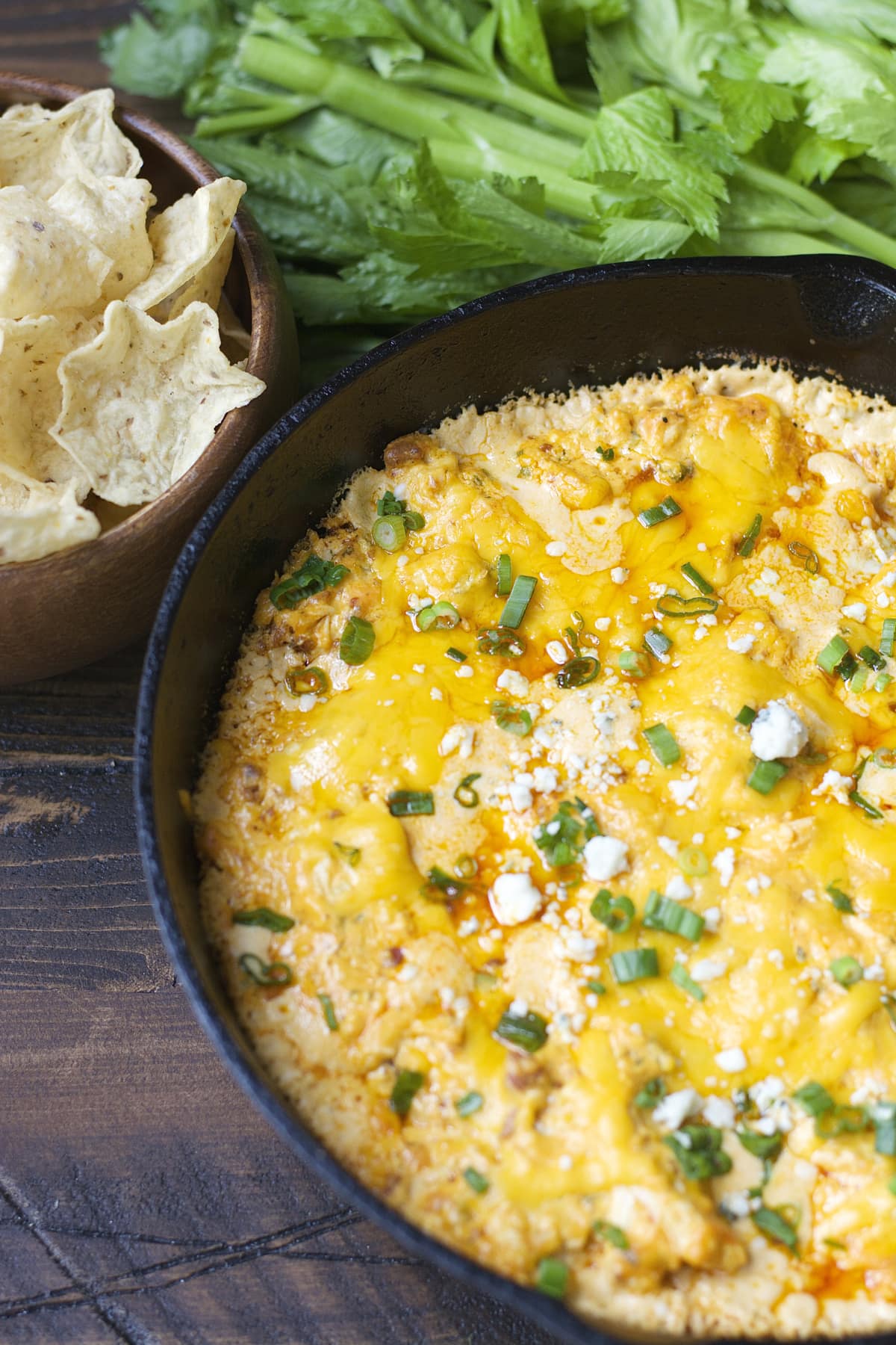 This Keto Blue Cheese Bacon Buffalo Chicken Dip goes great with chips, veggies, and low-carb dipper options like pork rinds and cheese crisps!