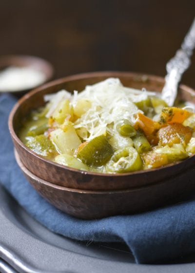 This simple five ingredient Creamy Pesto Veggie and Orzo Soup is vegan, gluten free and ready in under 20 minutes!