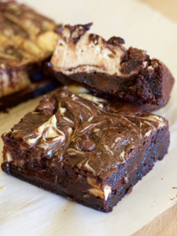 These easy Double Chocolate Peanut Brownies are loaded with dark chocolate flavor, creamy cheesecake and rich peanut butter!