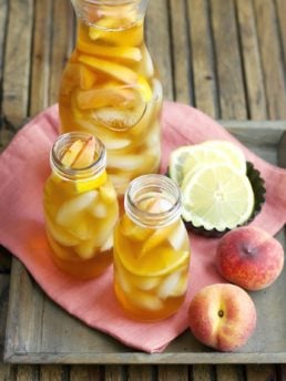 Sweet and refreshing Vanilla Peach Tea is the perfect Summer drink! Serve with fresh peach and lemon slices for simple Summer entertaining!