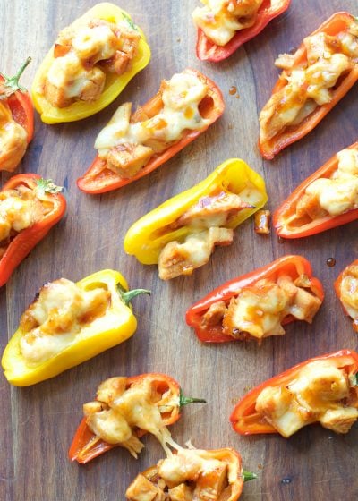 This simple six ingredient dish is perfect for Summer entertaining! Your guests will love these sweet and spicy Honey Chipotle Chicken and Gouda Stuffed Sweet Peppers!