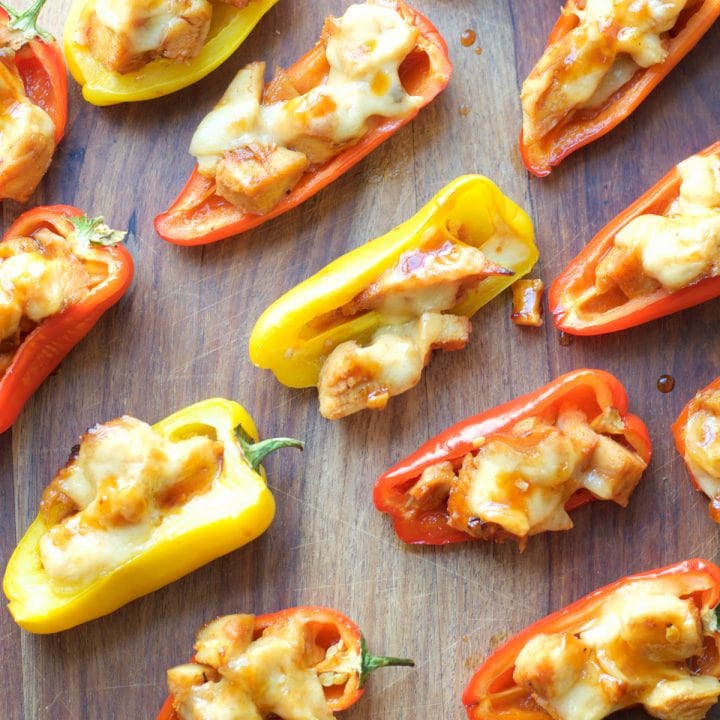 This simple six ingredient dish is perfect for Summer entertaining! Your guests will love these sweet and spicy Honey Chipotle Chicken and Gouda Stuffed Sweet Peppers!