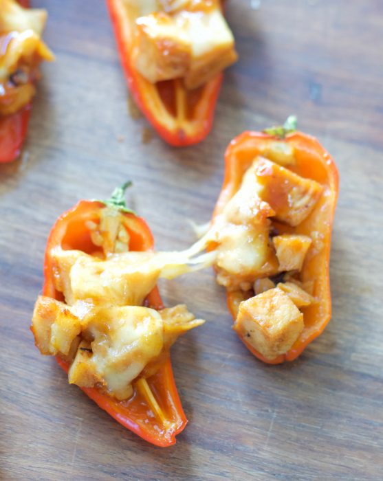 This simple six ingredient dish is perfect for Summer entertaining! Your guests will love these sweet and spicy Chipotle Chicken Stuffed Peppers!