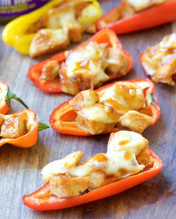 This simple six ingredient dish is perfect for Summer entertaining! Your guests will love these sweet and spicy Chipotle Chicken Stuffed Peppers!