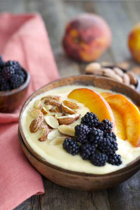 Sweet peaches, almond milk and a touch of vanilla and honey are blended until smooth and topped with crunchy granola for a hearty healthy breakfast! This easy Peach Smoothie Bowl will be a new favorite!