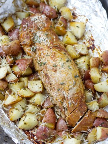 This easy Grilled Herb Crusted Potatoes and Pork Tenderloin Foil Packet is an effortless Summer meal perfect for busy weeknights!
