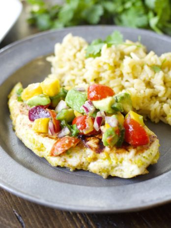 This Sweet and Spicy Habanero Chicken with Mango Salsa is grilled to perfection and packed with flavor!