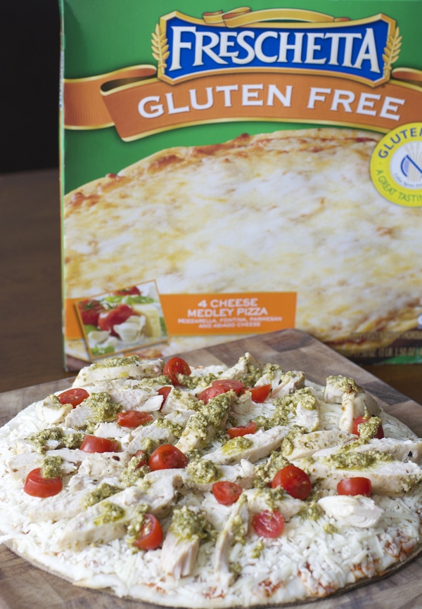 This easy four ingredient gluten free Grilled Pesto Chicken Pizza will make weeknight dinners a breeze!