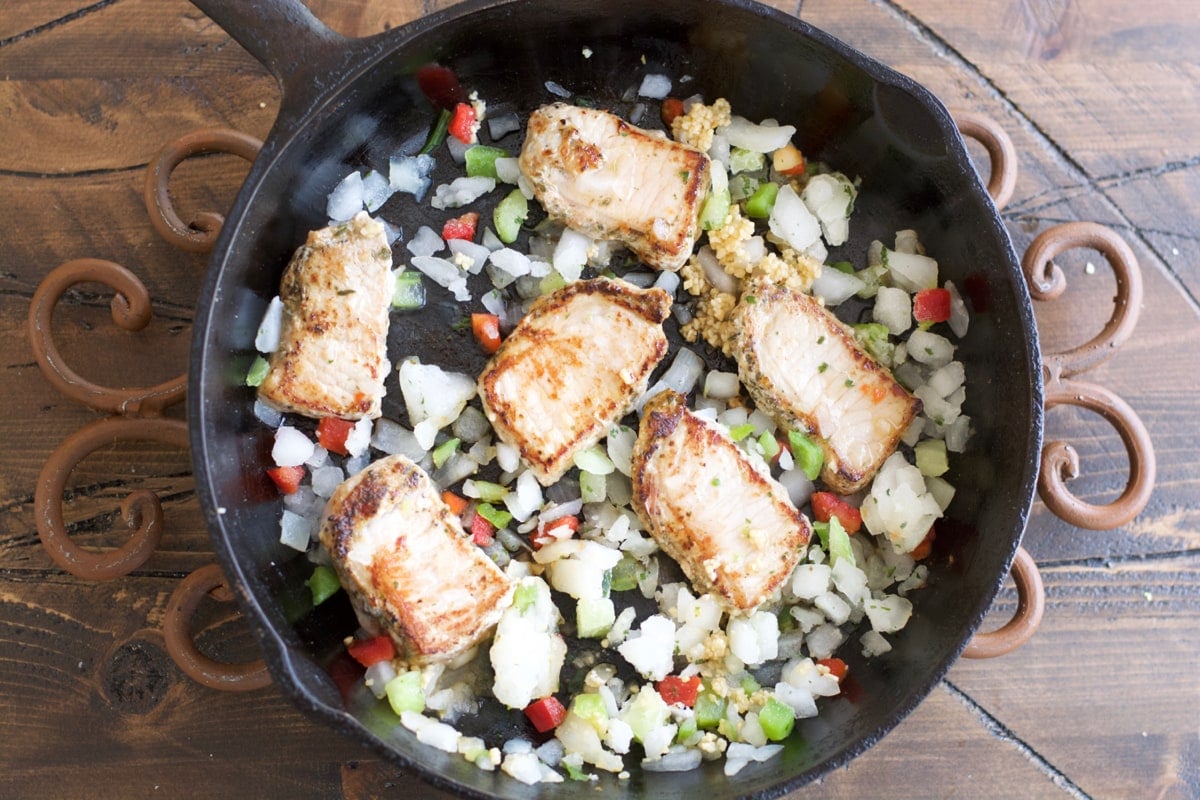 Make these easy one pan Garlic Herb Pork Medallions with Tuscan White Beans for a hearty comforting dish ready in under 30 minutes!