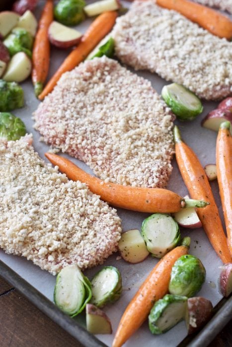 Try these easy One Pan Crispy Pork Chops and Ranch Roasted Veggies for an easy Fall meal ready in just 30 minutes!