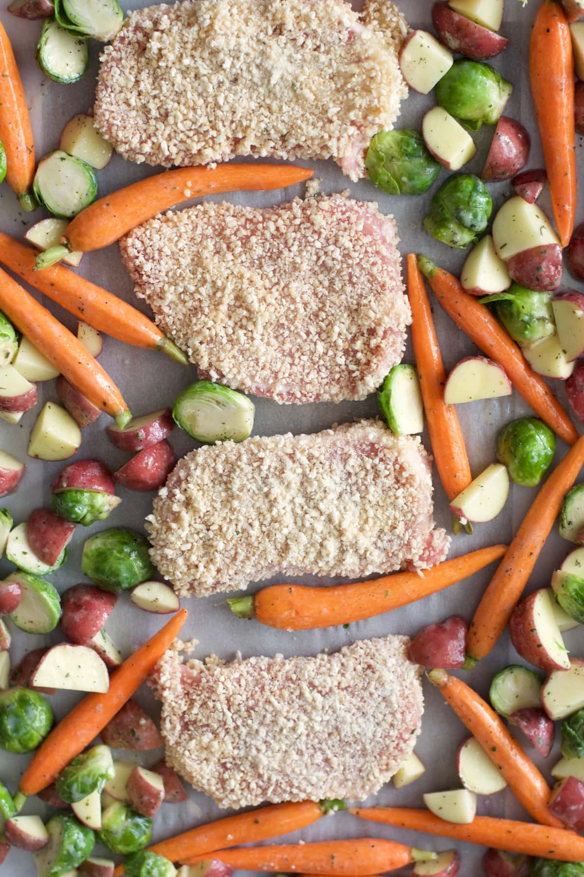 Try these easy One Pan Crispy Pork Chops and Ranch Roasted Veggies for an easy Fall meal ready in just 30 minutes!