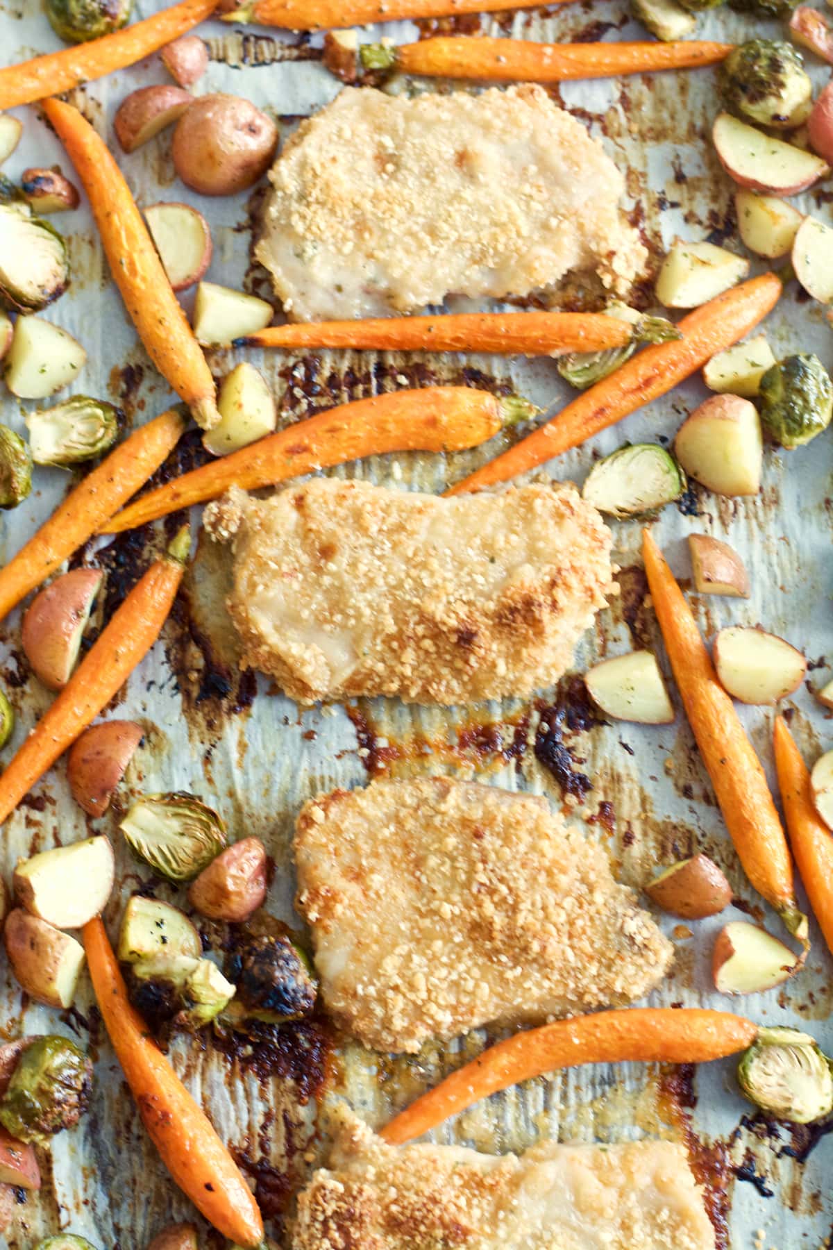 Try these easy One Pan Crispy Pork Chops and Ranch Roasted Veggies for an easy Fall meal ready in just 30 minutes!