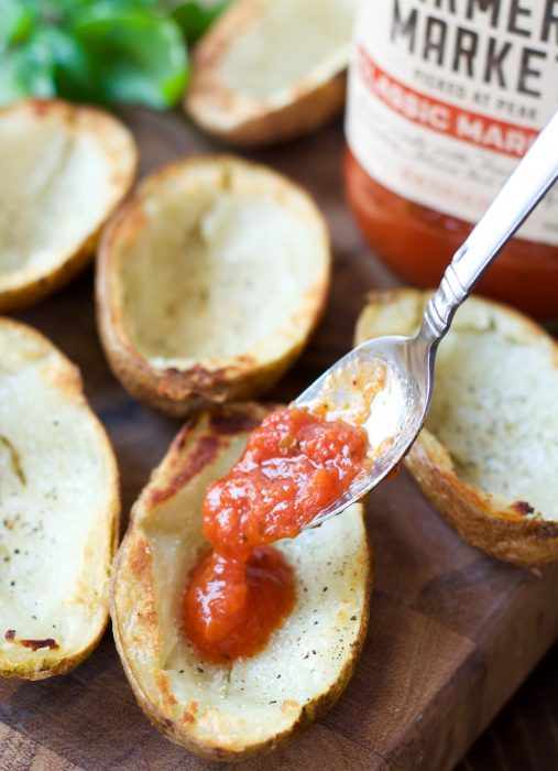 You can make these Chicken Parmesan Potato Skins with just five simple ingredients! This easy recipe will become a family favorite!