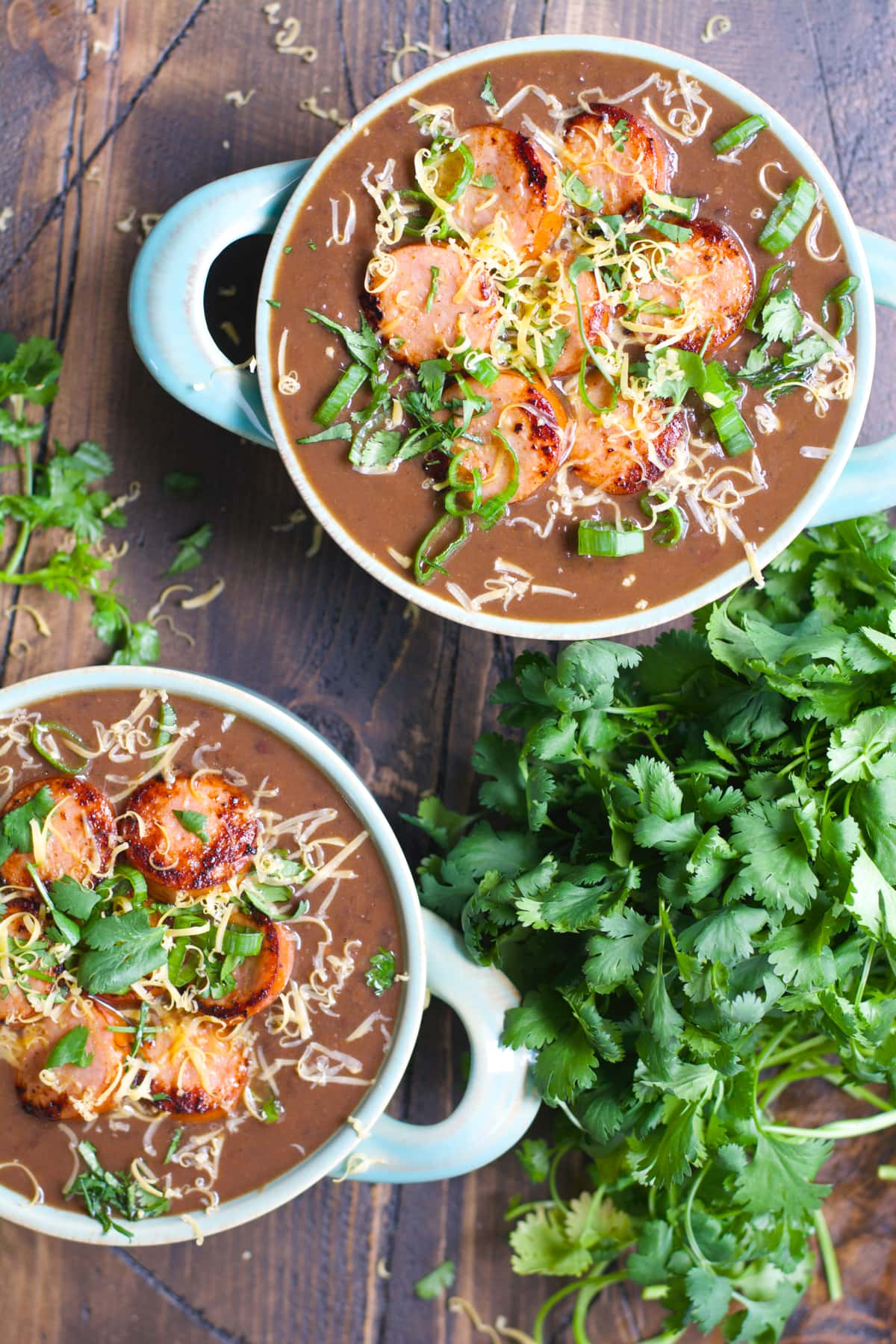 This five ingredient Smokey Black Bean Soup with Spicy Sausage is a simple hearty dish perfect for busy weeknights!