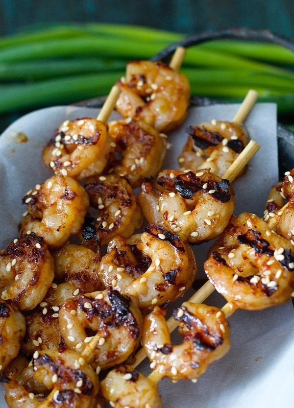 grilled sesame shrimp skewers on parchment paper 