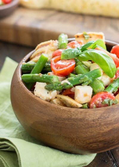 This delicious Asparagus and Tomato Panzanella Salad comes together with just a few simple ingredients! A healthy and delicious salad you will love all Summer long!