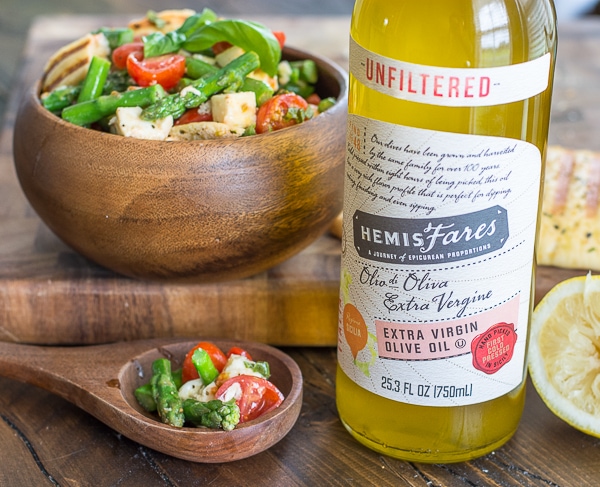 This delicious Asparagus and Tomato Panzanella Salad comes together with just a few simple ingredients! A healthy and delicious salad you will love all Summer long!
