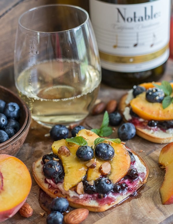 This simple Sweet Peach Bruschetta combine the best flavors of Summer! Fresh peaches, blueberries and mint make for an impressive combination! 