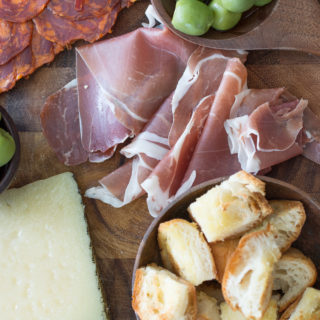 charcuterie on wooden cutting board