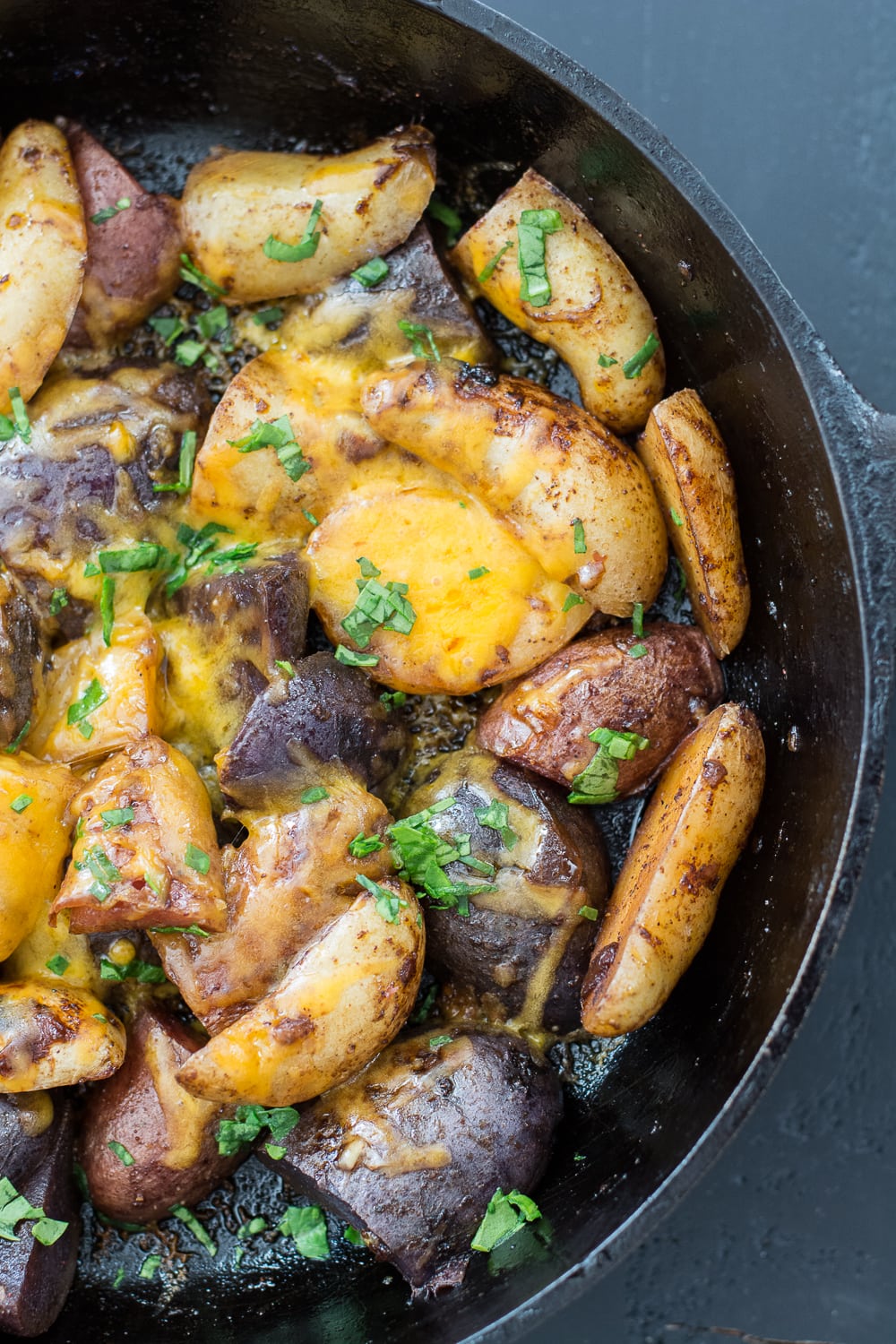 Quick and easy Pan Roasted Chipotle Fingerling Potatoes! This is the perfect sweet and spicy side dish to mix up your dinner routine!