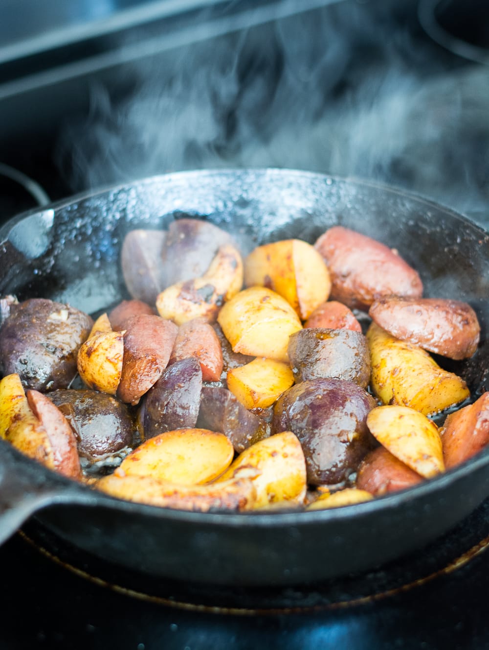 Quick and easy One Pan Chipotle Potatoes! This is the perfect sweet and spicy side dish to mix up your dinner routine!