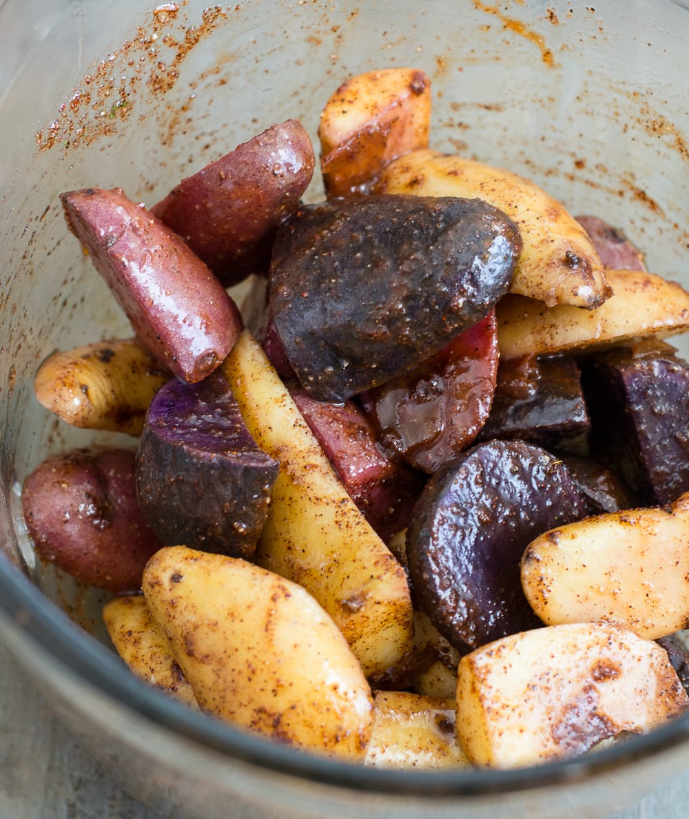 Quick and easy One Pan Chipotle Potatoes! This is the perfect sweet and spicy side dish to mix up your dinner routine!