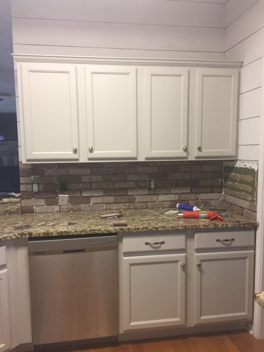 Update your kitchen with an Easy DIY Brick Backsplash! This affordable project is perfect for beginners who are looking for that classic farmhouse style!