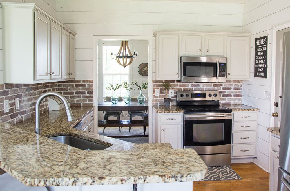 Update your kitchen with an Easy DIY Brick Backsplash! This affordable project is perfect for beginners who are looking for that classic farmhouse style! #diy #fixerupperstyle