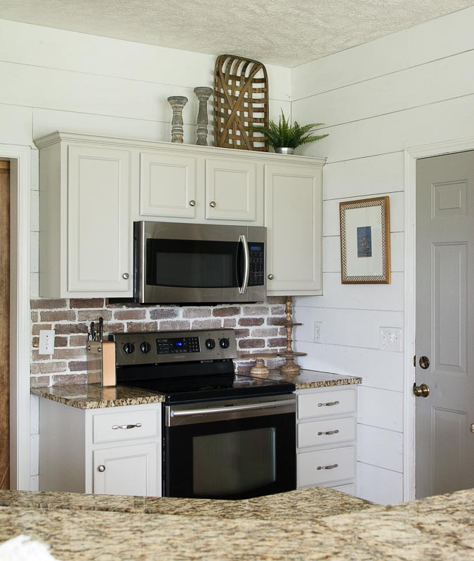 Update your kitchen with an Easy DIY Brick Backsplash! This affordable project is perfect for beginners who are looking for that classic farmhouse style!