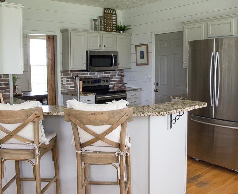 Update your kitchen with an Easy DIY Brick Backsplash! This affordable project is perfect for beginners who are looking for that classic farmhouse style!