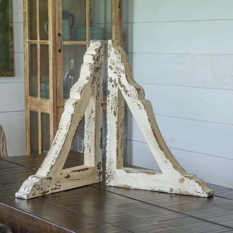 This super easy DIY Corbel Table adds a ton of farmhouse charm to any space! See how you can easily create this look in three simple steps!