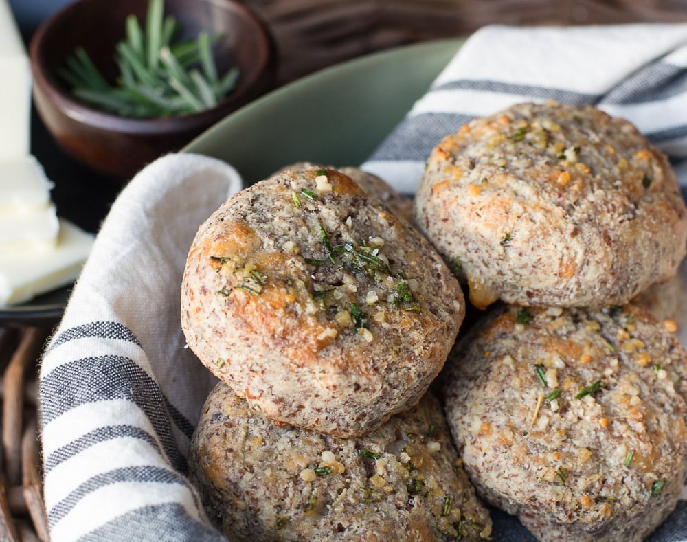 keto dinner rolls in a tea towel-lined bowl 