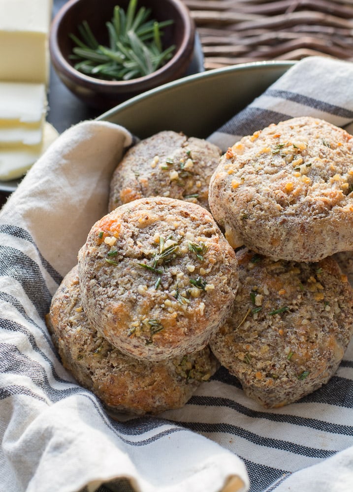 keto rolls in a tea towel-lined bowl 