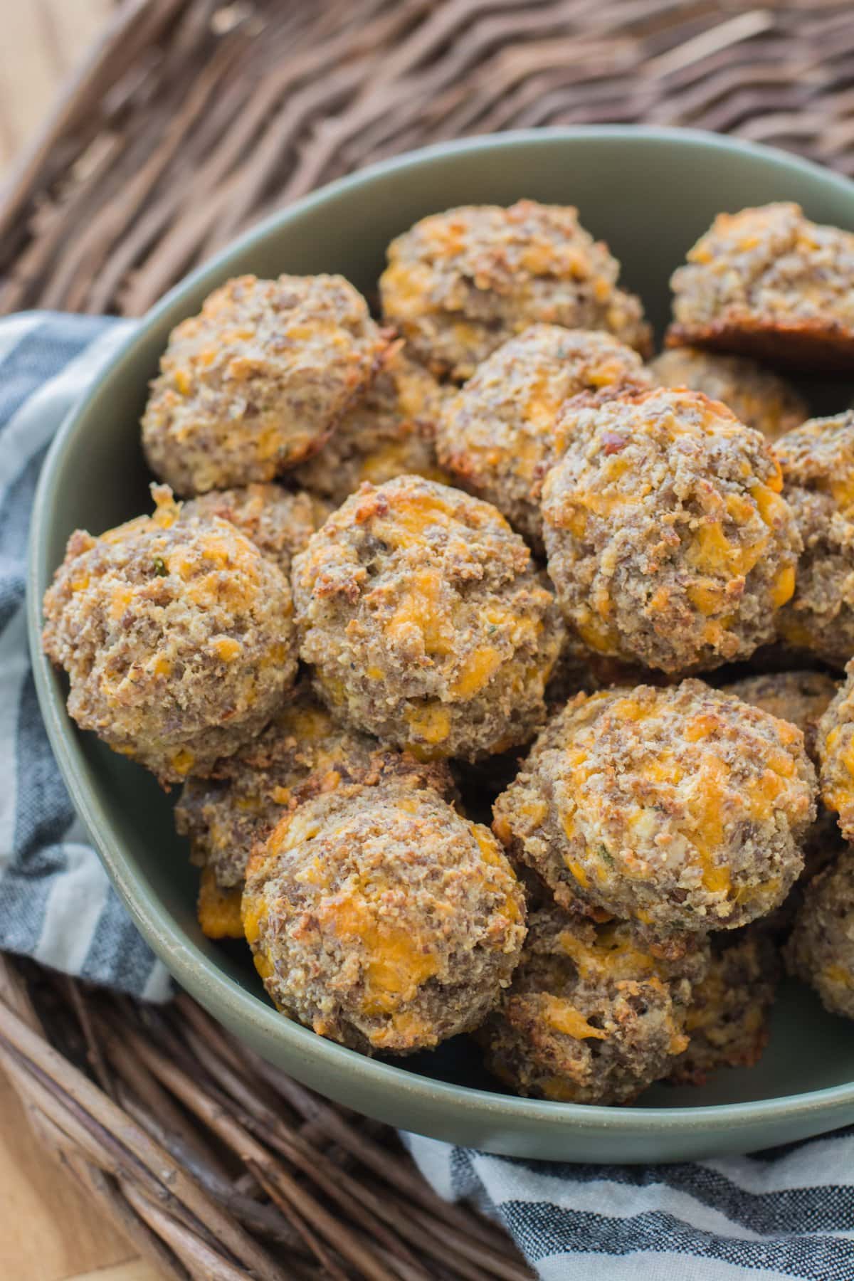 cream cheese sausage balls in a gray bowl 