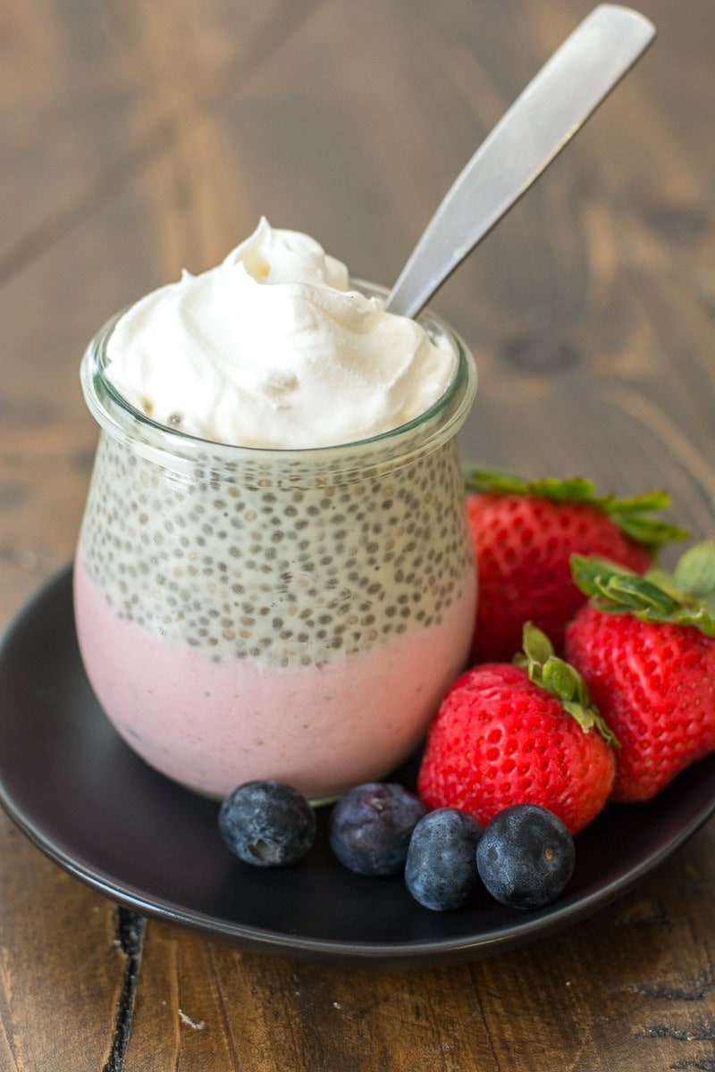 This decadent Keto Strawberry Cheesecake Parfaits feature a creamy strawberry cheesecake layer topped with vanilla chia seed pudding! A sweet keto treat under 5 net carbs!