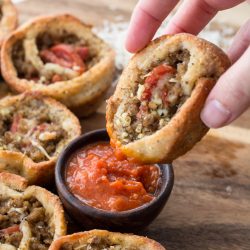 These easy Keto Pizza Rolls are loaded with Italian sausage and pepperoni! The perfect low carb, keto appetizer or easy dinner! #keto