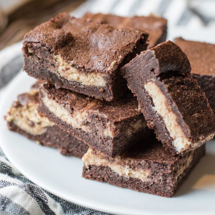 Keto Peanut Butter Cheesecake Brownies are packed with rich, fudgy chocolate and swirled with a rich peanut butter cheesecake layer! All low carb and keto approved!