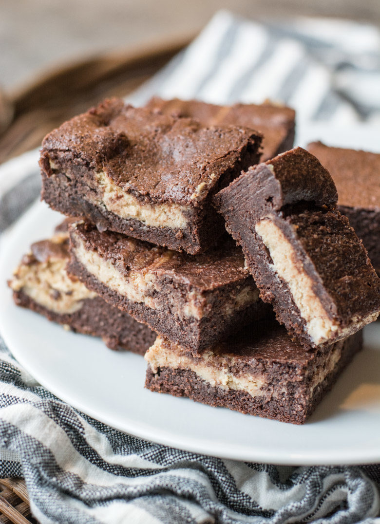 Keto Peanut Butter Cheesecake Brownies are packed with rich, fudgy chocolate and swirled with a rich peanut butter cheesecake layer! All low carb and keto approved!