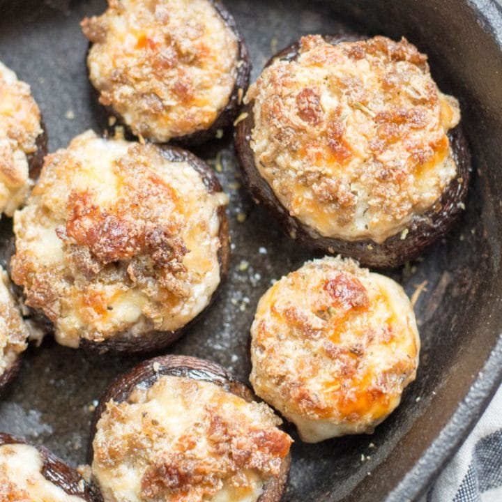 Easy Keto Stuffed Mushrooms are loaded with spicy sausage and cheese for the perfect keto appetizer! #keto