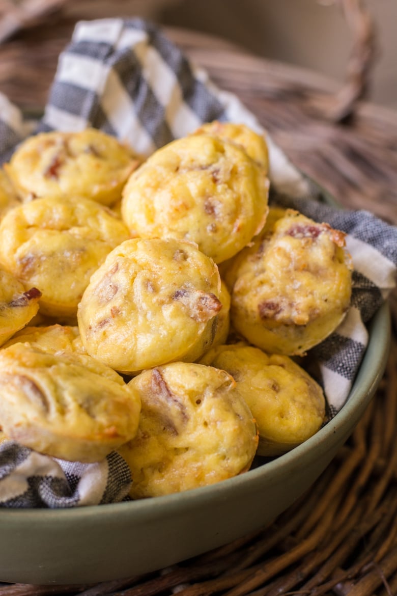 oven baked egg bites in a towel-lined bowl 