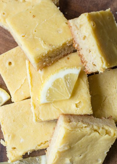 The best keto lemon bars! These sweet and tangy bars are low carb, gluten free and keto approved! #keto