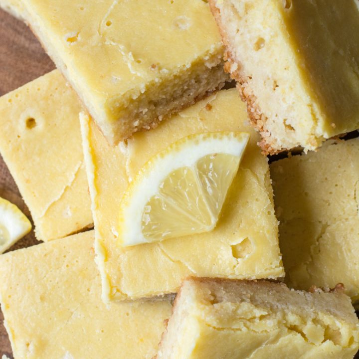 The best keto lemon bars! These sweet and tangy bars are low carb, gluten free and keto approved! #keto
